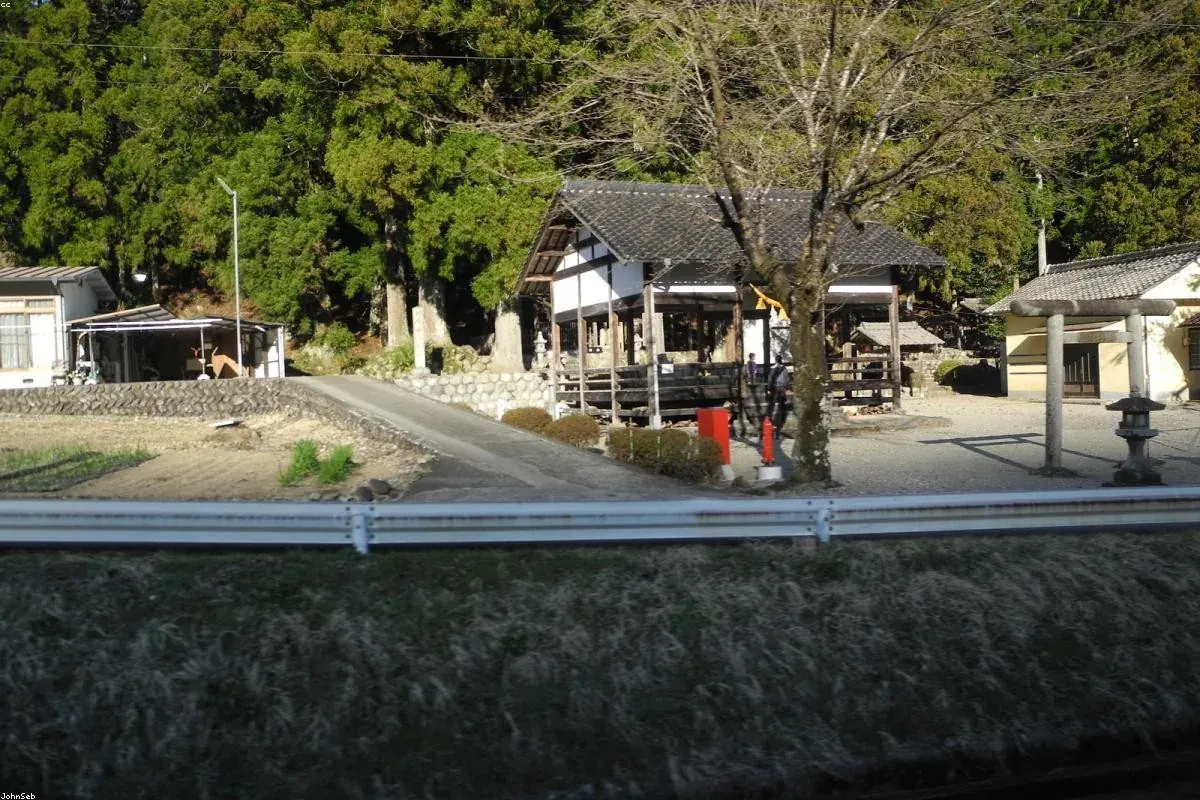 Quiet road through a rural Japanese village on a sunny day